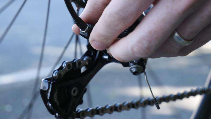 Use the gear barrel adjuster to fix your gears