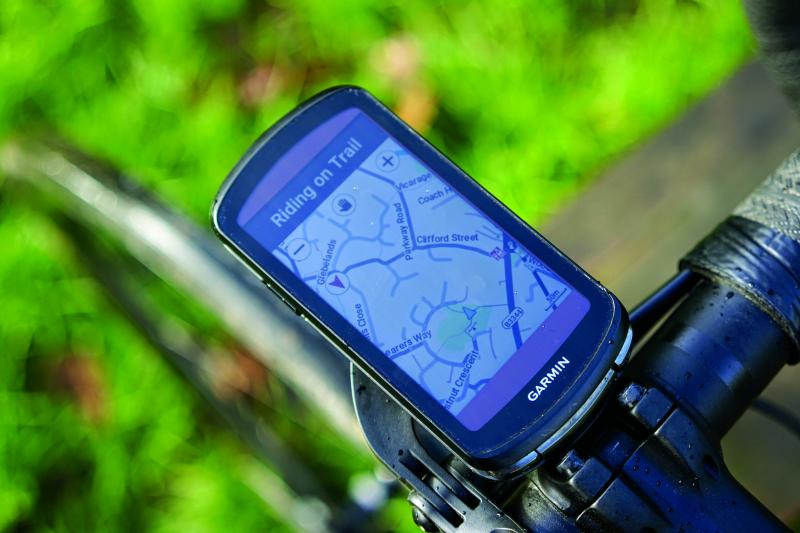 A Garmin bicycle computer displaying a small map