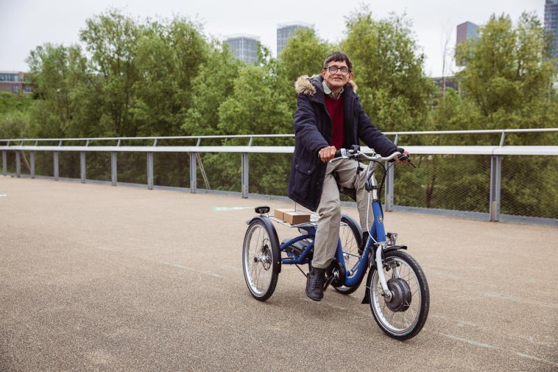 Man riding an e-cycle