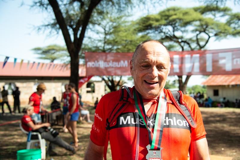 David completing charity ride in Kenya