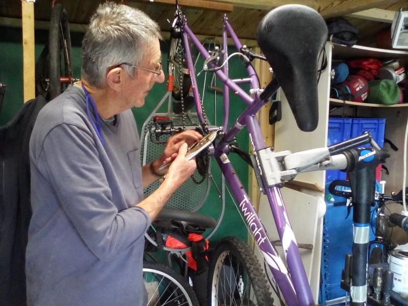 Davin Palmer busy fixing bikes in his shed