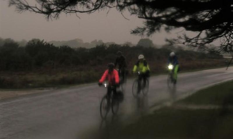 Riders in the rain by Mike Walsh