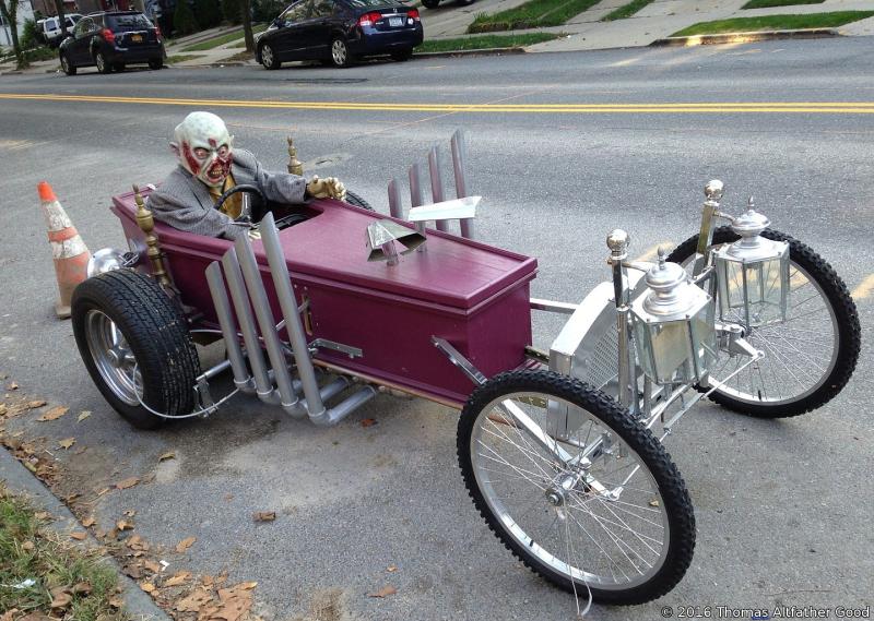 Zombie emerging from a coffin bike