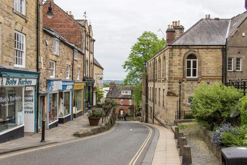 Stone buildings lining a steep town street