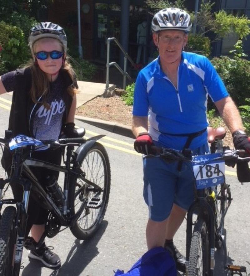 Ian and his daughter Charlotte taking on a charity bike ride