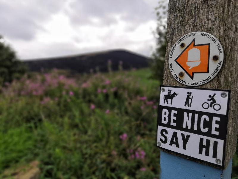 Be Nice Say Hi sign in use on Pennine Bridleway