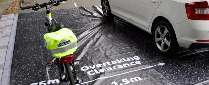 The Devon and Cornwall and Dorset Police Alliance demonstrate their Cycling UK mat