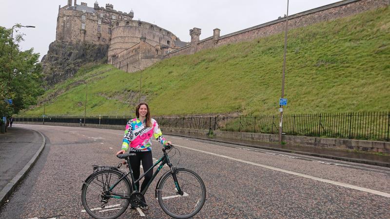 Student nurse Polly with her bike in Edinburgh