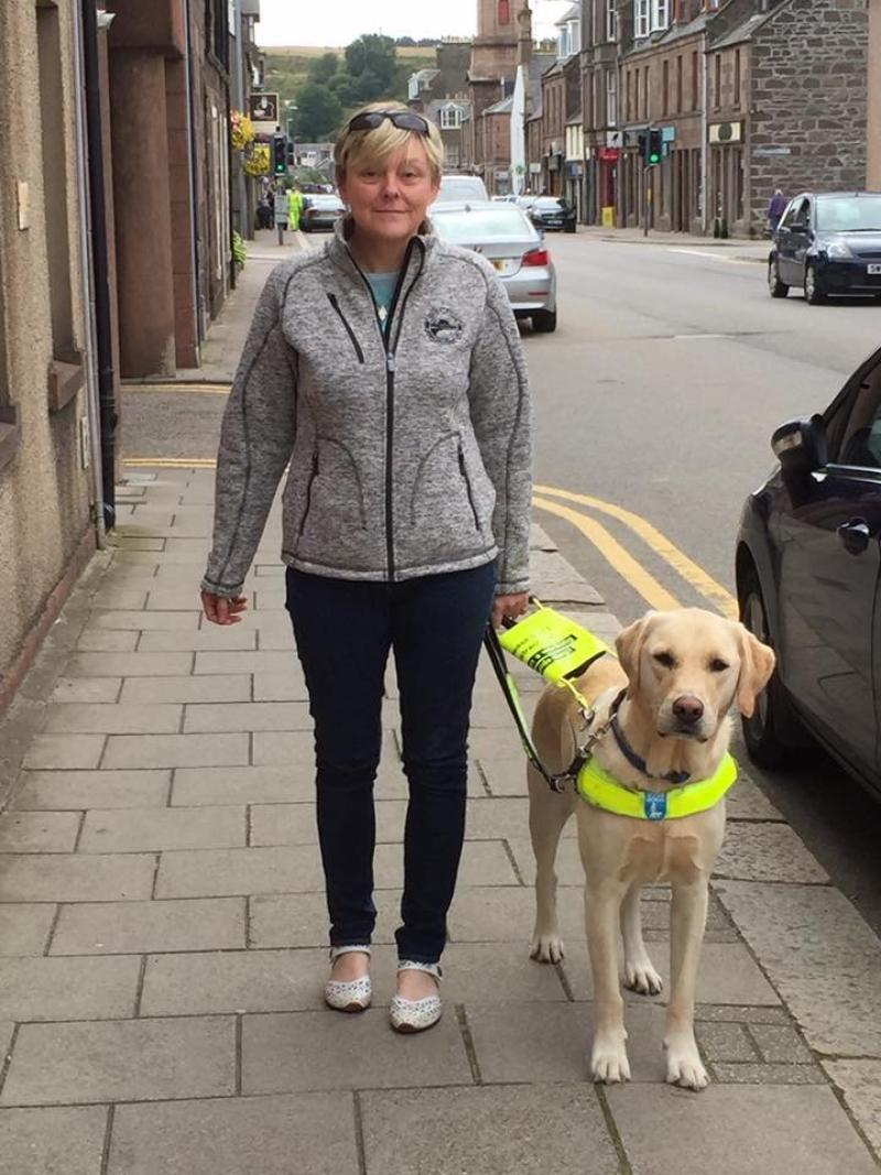 Shona and her guide dog Woody