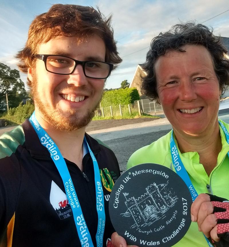 Linda and her son with their Wild Wales Challenge medals