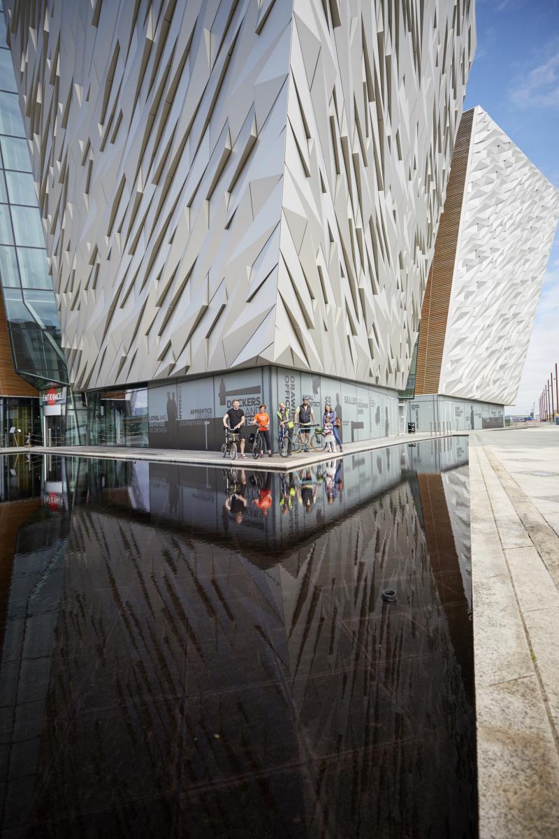 Five people stood outside the Titanic Museum