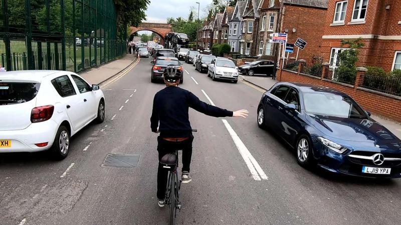 Cyclist signalling to turn right