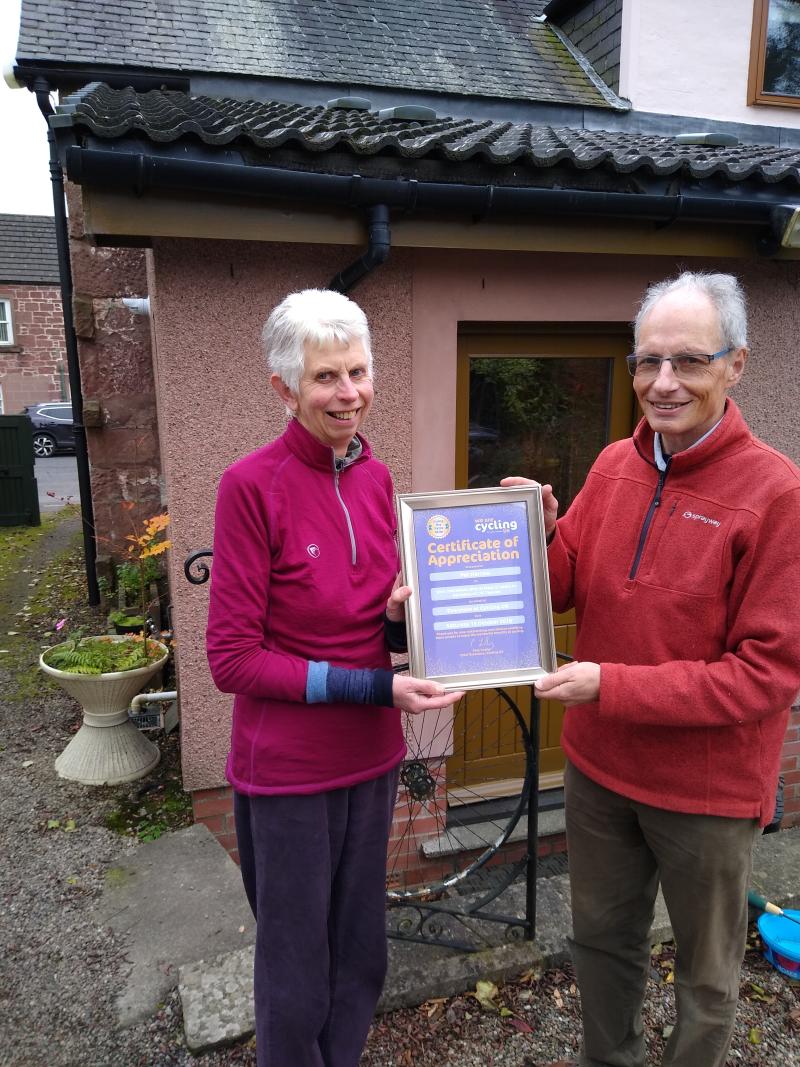 Pat Harrow receives a Certificate of Appreciation from David Ryder Photo CTC Tayside