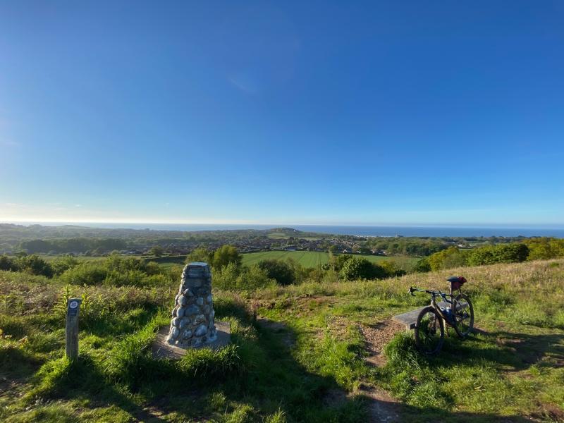 View from a hill top with trigpoint