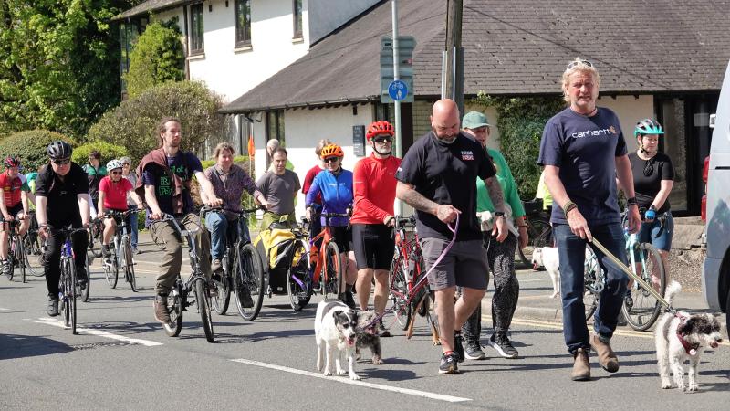Dog walkers and cyclists taking part in the Lon Las Mon campaign rally