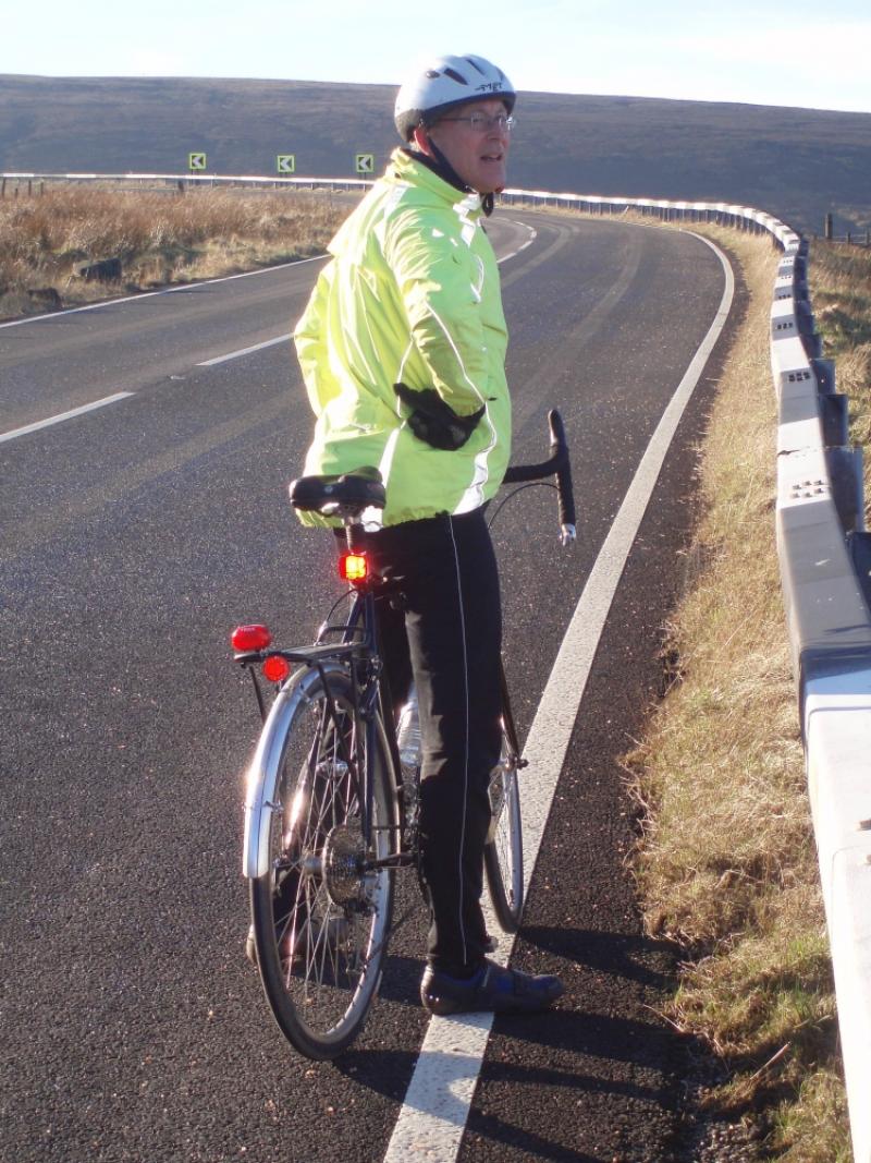 Paul Smith contemplates the view after getting to the top of a hill