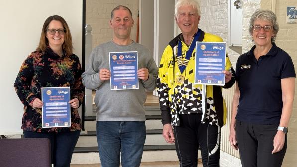 A group of people with certificates