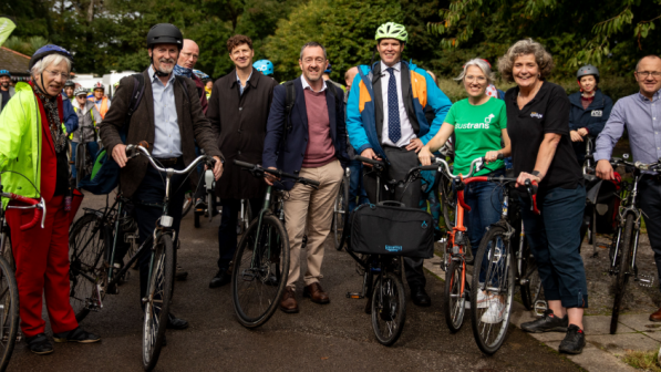 Active Travel Act Ten Year Anniversary gathering featuring Cycling UK staff, members of the public and Welsh MS