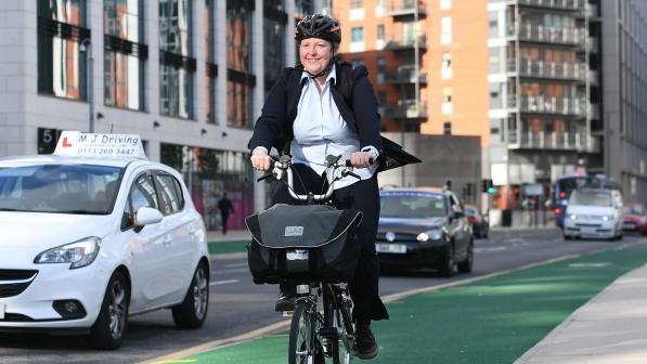 Cyclist on bike lane in Leeds