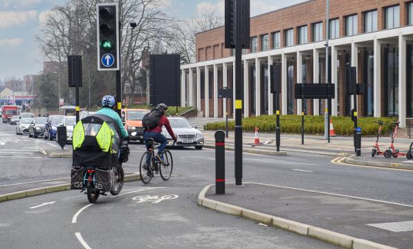 Cycling infrastructure being used in Birmingham by two cyclists