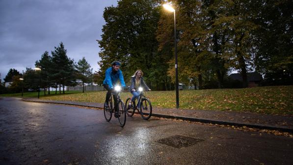 Cyclists riding at night