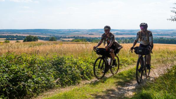Two cyclists on a bridleway section of the Royal Chilterns Way route between South Stoke and Ewelme