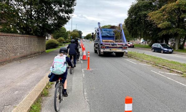Cyclists in the temporary lane on Upper Shoreham Road