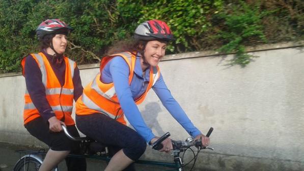 Charlotte riding with her family