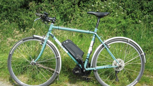 Hallett bike with added wheel sensor, battery and motor