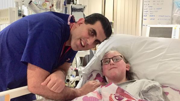 Eve Berry with her father Dave at her hospital bedside