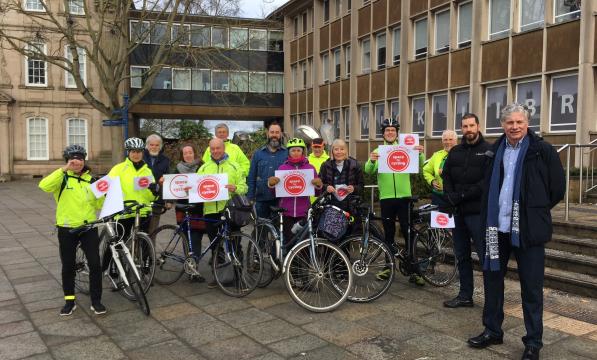 Residents gather outside the Shire Hall to show their support for cycling