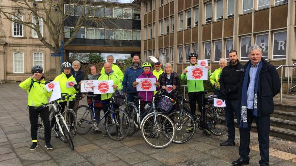 Residents gather outside the Shire Hall to show their support for cycling