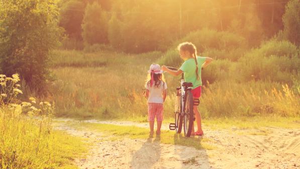 Young children out on a bike ride