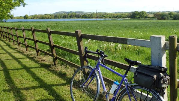 Touring bike by a field