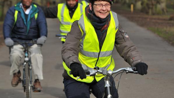 A volunteer in Manchester helps with the Big Bike Revival