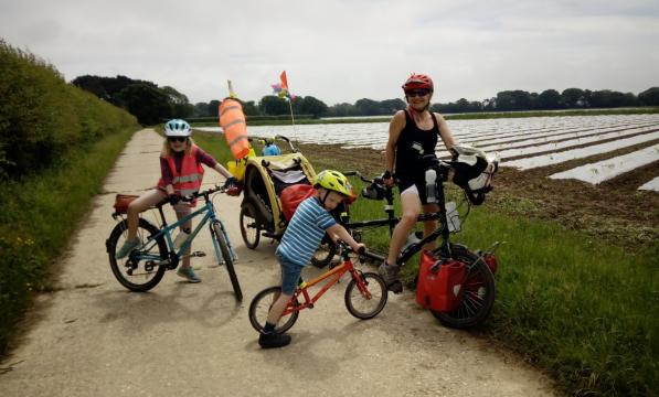 Family riding on the Salterns Way