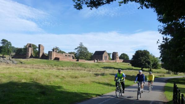 Picture or riders in autumn landscape