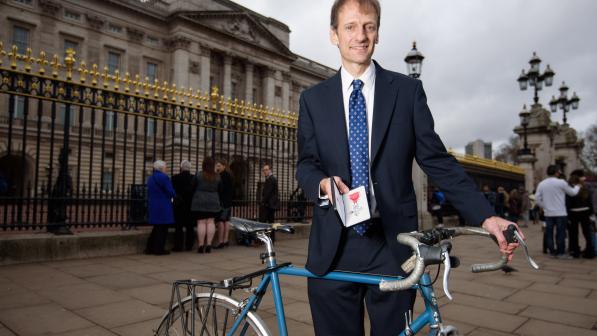 Roger Geffen MBE outside Buckingham Palace