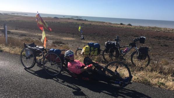 Karen Darke on her handcycle alongside the Murray River