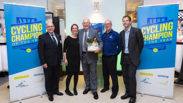 Mick Heath receives his Cycling Champion of the Year award