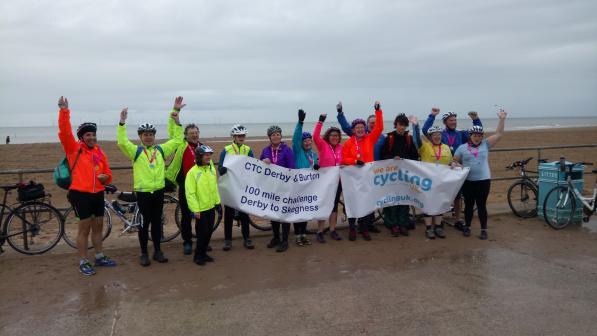 The Couch to Coast finishers celebrating after reaching Skegness
