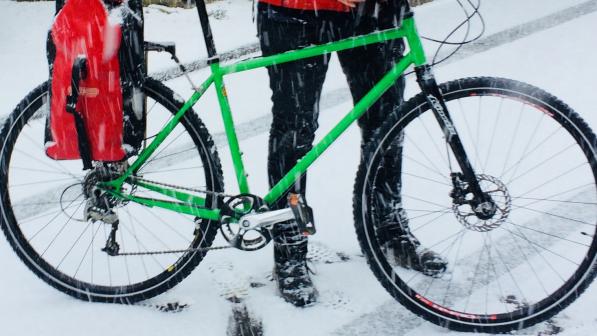 Liz Colebrook cycling in the snow