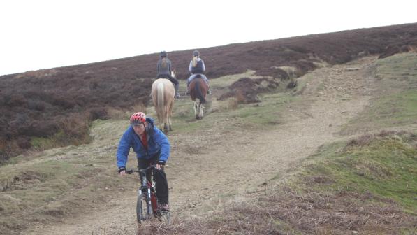 Mountain bike riders on a trail Photo by John Horscroft