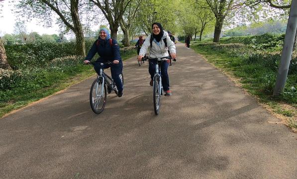 Two friends go for a bike ride in East London 
