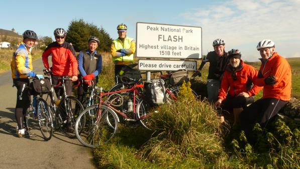 Cyclist from South Manchester CTC by the sign for Flash village