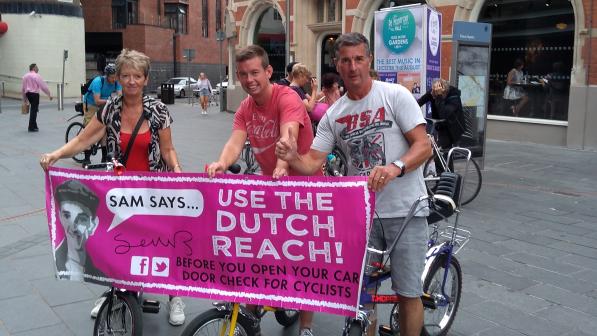 A critical mass memorial ride for Sam Boulton promoted the use of the Dutch Reach