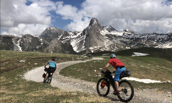 Two cyclists bikepacking in the Italian Dolomites