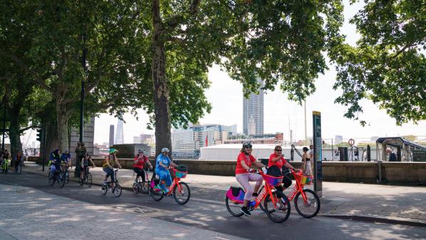 Women cycling along the East West Cycle Superhighway in London