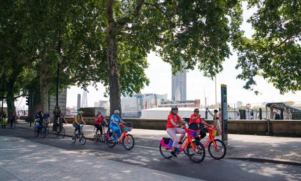 Women cycling along the East West Cycle Superhighway in London