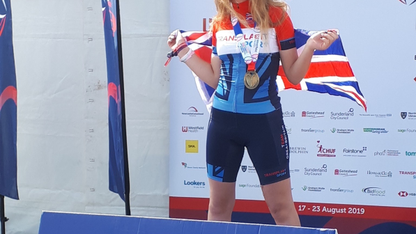 Jaimee receiving her gold medal at the World Transplant Games